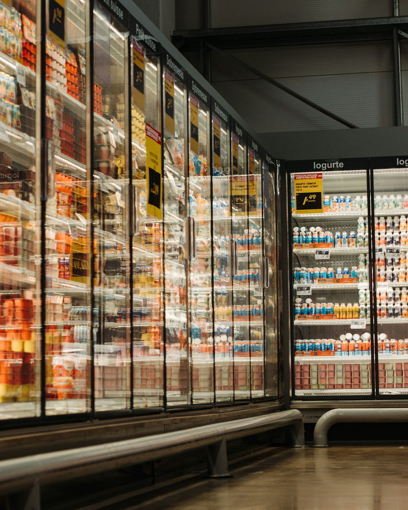 Refrigerated dairy cases in a supermarket